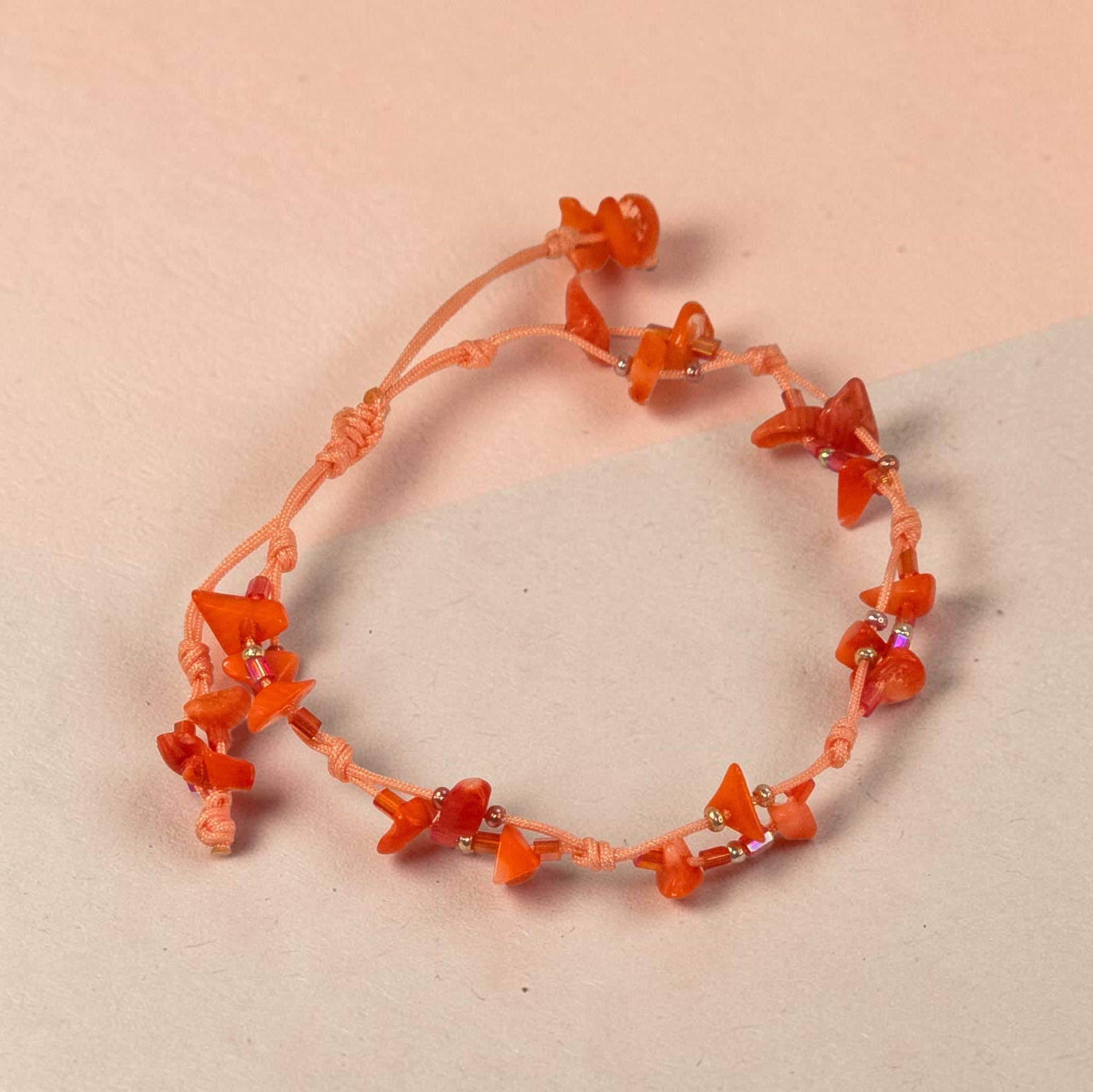 Pulsera "Destello Coral"